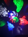 Projektor LED świąteczny kolorowy mikołaj śnieżynki  choinka różne motywy